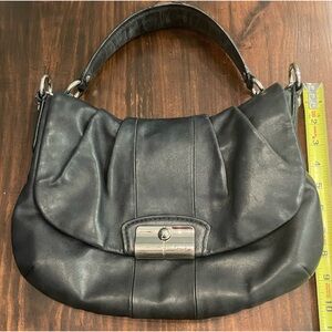 Coach purse. Has wear on the strap. Look at the photos. Smoke free home.